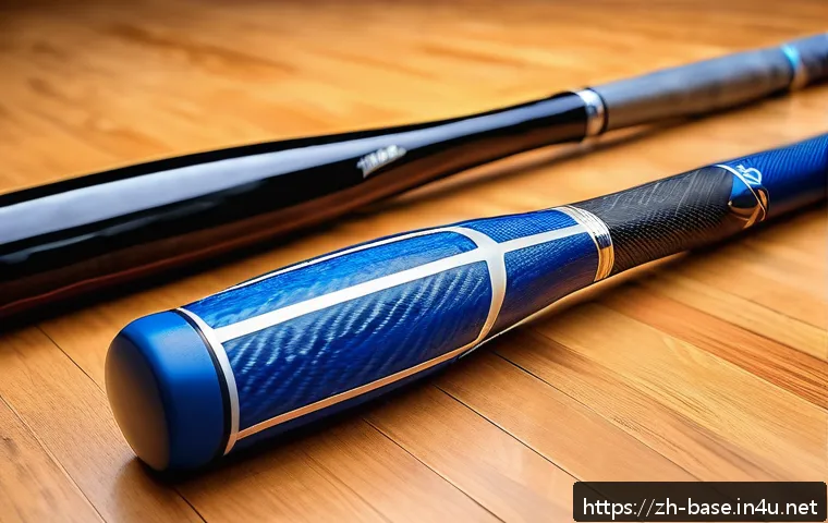 야구 배트 선택 가이드 - A detailed close-up of three types of baseball bats displayed side by side on a wooden sports floor:...